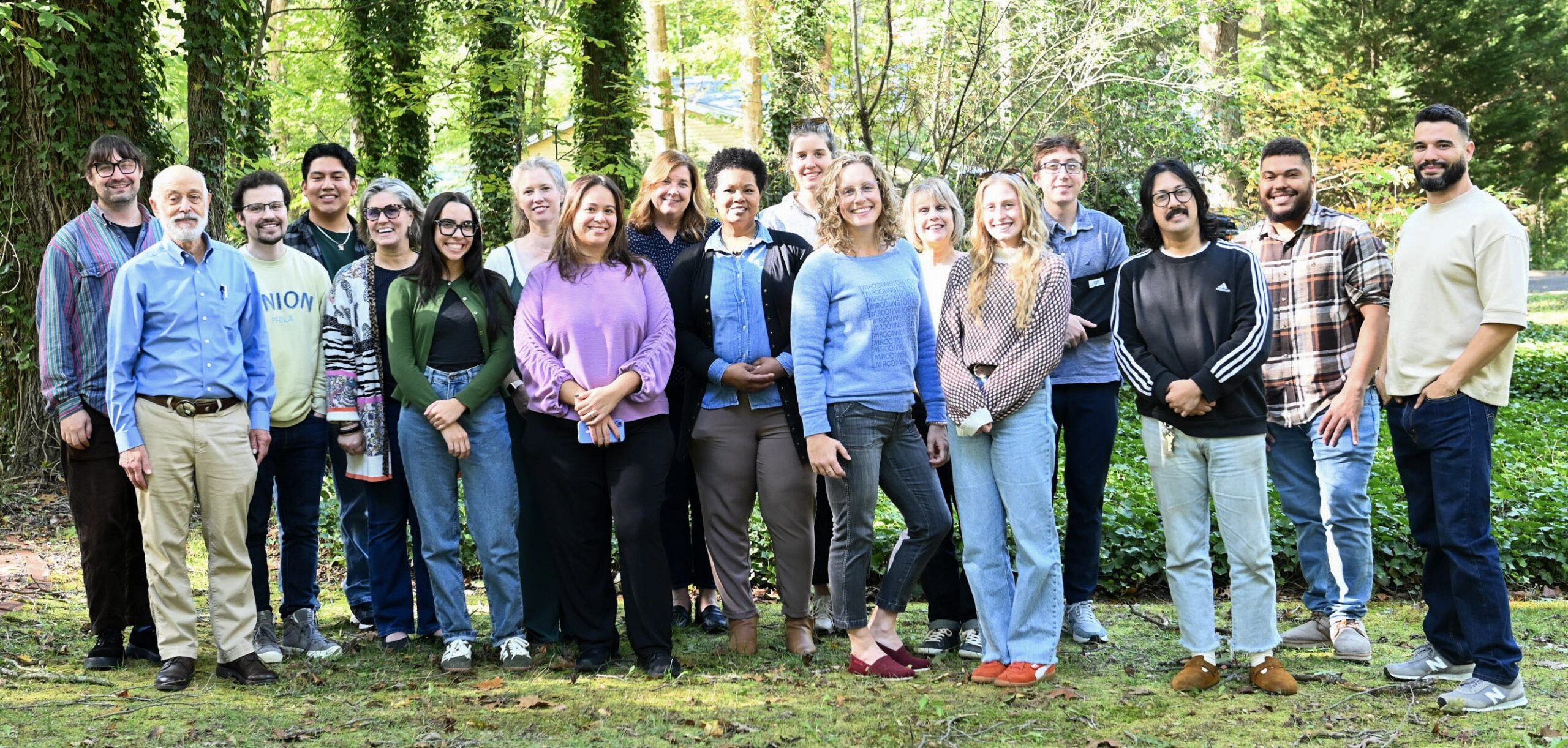 Photo of CLASI attorneys, advocates, and paralegals standing and smiling in a group.